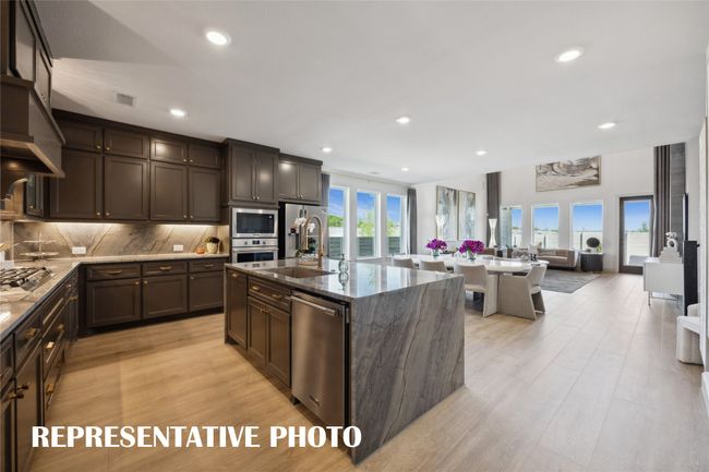 The chef will never be left out of the party in this fantastic open concept home. REPRESENTATIVE PHOTO | Image 6
