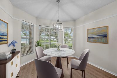 A sunny Breakfast nook is located in the Kitchen area. | Image 3