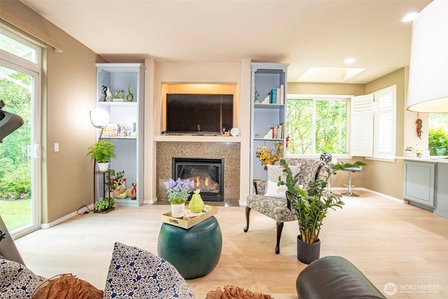 Family Room has built in Bookcases. | Image 16