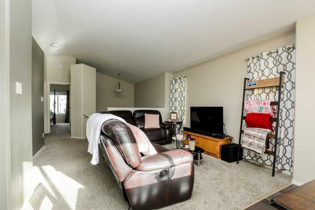 248 Sunridge Road W, Home with 4 bedrooms, 2 bathrooms and 2 parking in Lethbridge AB | Image 3