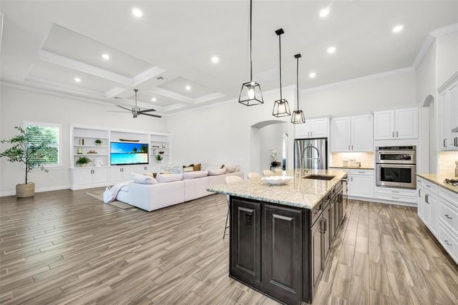 view of kitchen and living room from dining room | Image 21