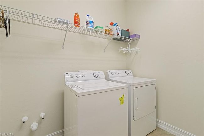 Large laundry room equipped for a wetsink. | Image 19