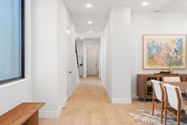 Hallway featuring visible vents, recessed lighting, light wood-type flooring, and baseboards | Image 14