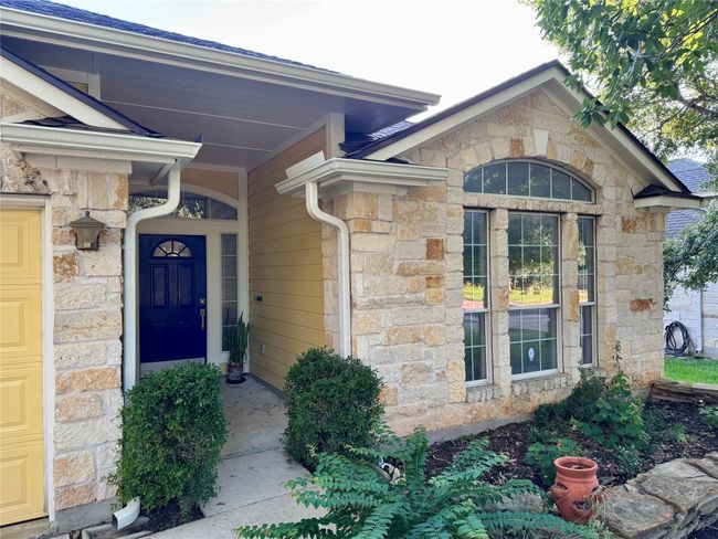 Lovely variegated stone and special windows | Image 11