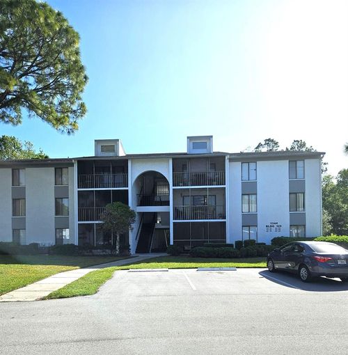 e3-1344 Pine Ridge Cir E, Tarpon Springs, FL, 34688-5401 | Card Image