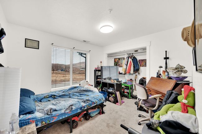 View of carpeted bedroom | Image 13