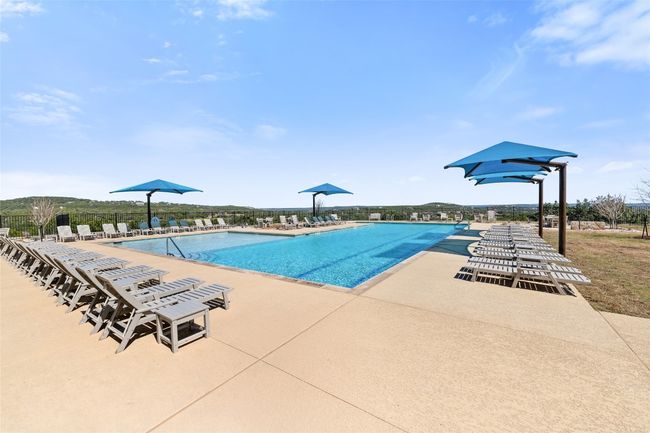 One of The Hollows community pools offers a refreshing escape with panoramic views of rolling hills in the background, creating a relaxing outdoor oasis. | Image 38