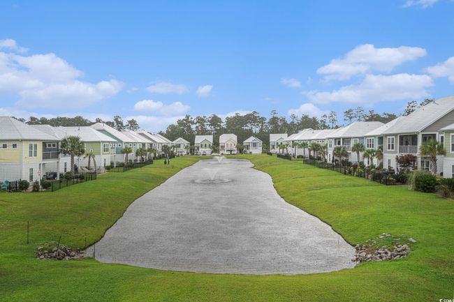 Surrounding community with a residential view and a lawn | Image 33
