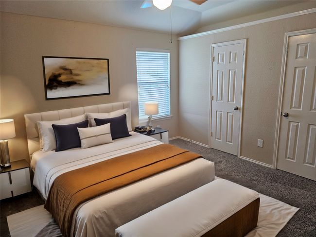 Bedroom with carpet floors and baseboards | Image 26