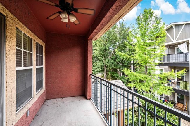 The balcony is perfect to lounge or cozy up with a good book. | Image 27
