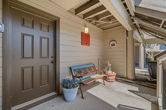 Doorway to property with a porch | Image 33