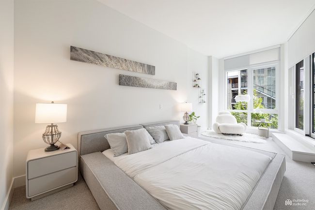 Bedroom with carpet floors | Image 12