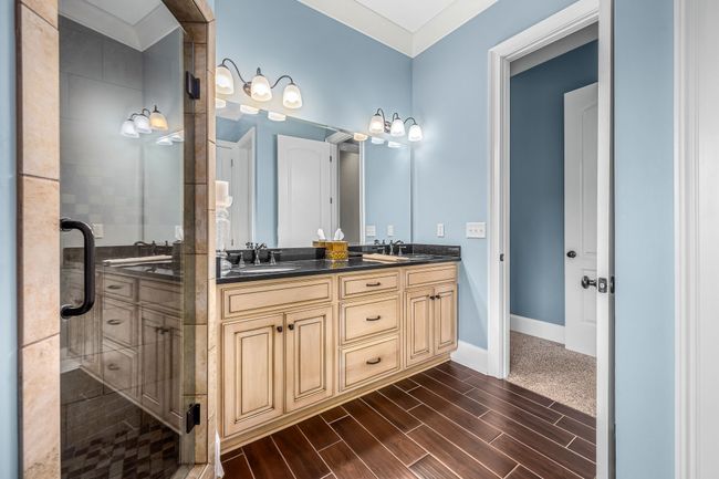 Lots of storage in this double vanity area in the Primary Suite bathroom. | Image 56