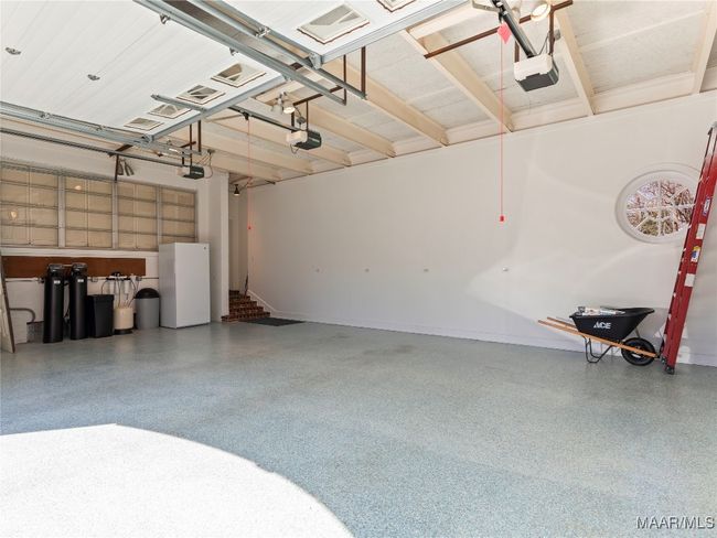 3-car garage boasts epoxy flooring | Image 40