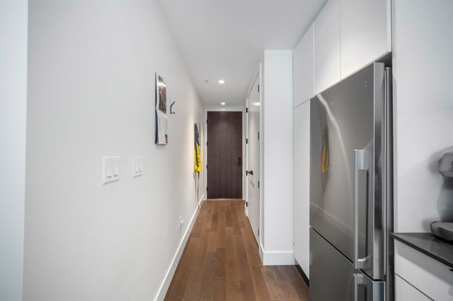 Hall featuring dark wood-style flooring and recessed lighting | Image 14