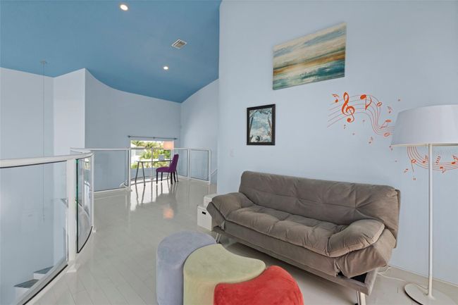 3rd floor loft space with access out to 3rd floor lanai. | Image 22