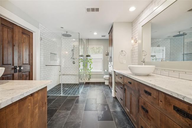 Primary bathroom with double sinks. | Image 8