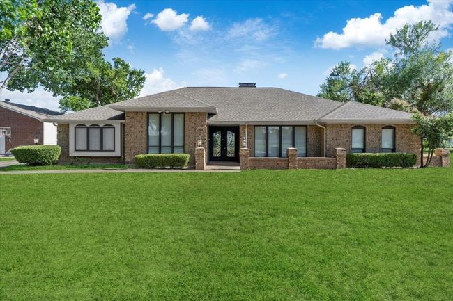 View of front of house featuring a front lawn | Image 1