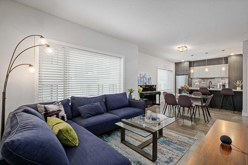 116 - 3375 15 Street Sw, Home with 3 bedrooms, 2 bathrooms and 1 parking in Calgary AB | Card Image