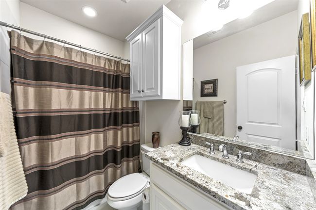 Front Guest Bathroom situated between two guest bedrooms. | Image 19