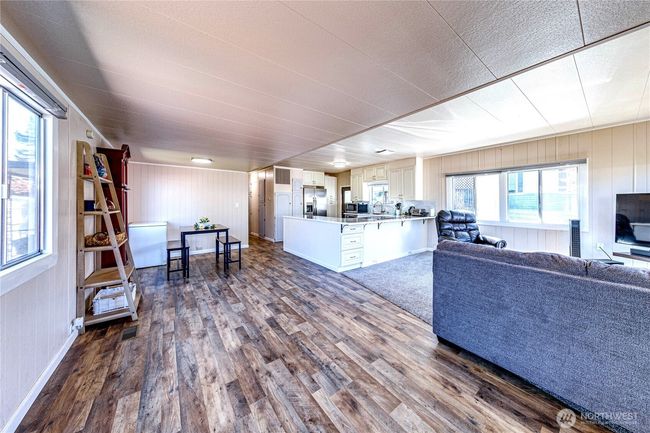 The open living, dining and kitchen area. | Image 6