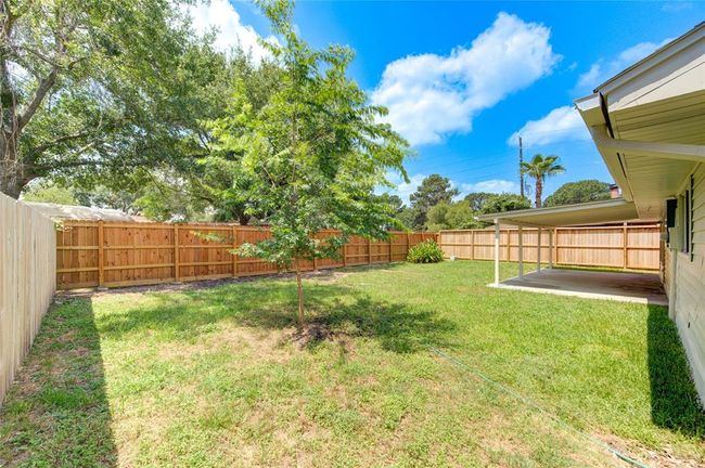 Large back yard with newer fencing. | Image 22