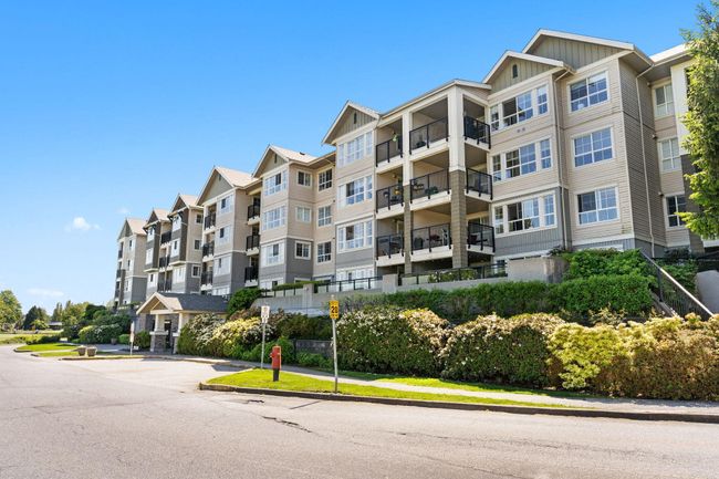 313 - 19673 Meadow Gardens Way, Condo with 2 bedrooms, 2 bathrooms and 2 parking in Pitt Meadows BC | Image 2