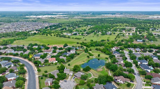 Aerial perspective of suburban area featuring a large body of water | Image 39