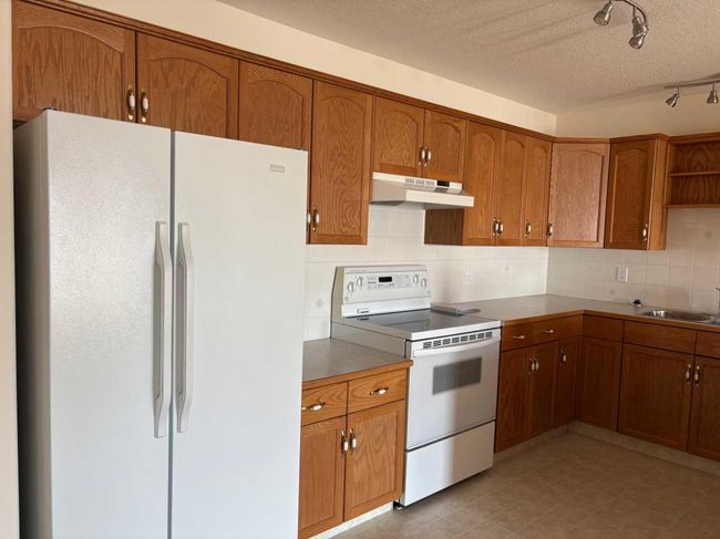 205 - 5600 Sunrise Crescent, Condo with 2 bedrooms, 1 bathrooms and 1 parking in Olds AB | Image 5