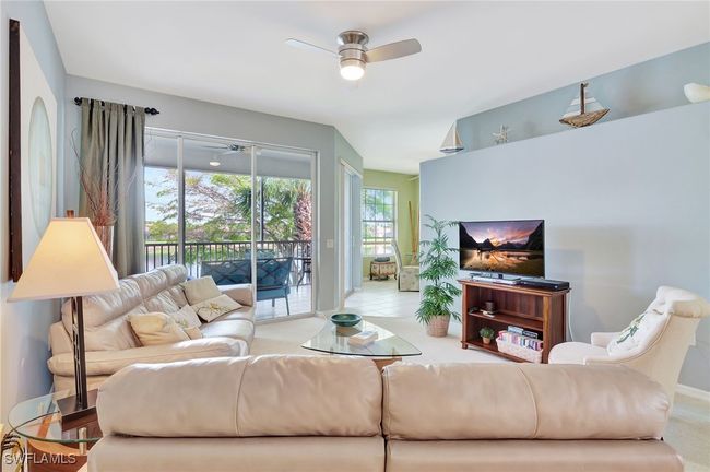 View of the lanai and lake, tastefully decorated | Image 8