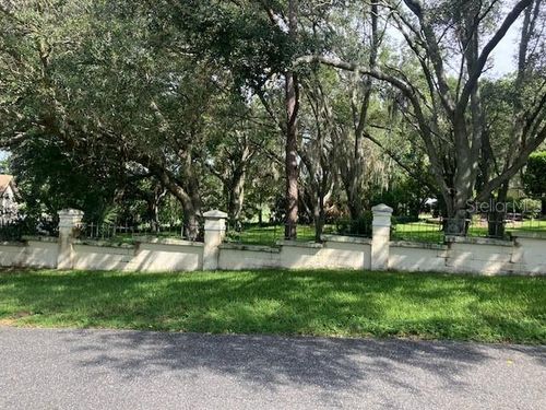 114 W Magnolia Ave, HOWEY IN THE HILLS, FL, 34737-3117 | Card Image
