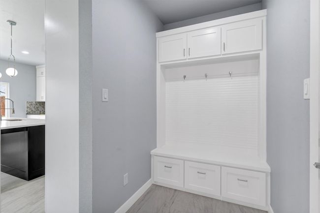 Mudroom featuring baseboards and a sink | Image 17