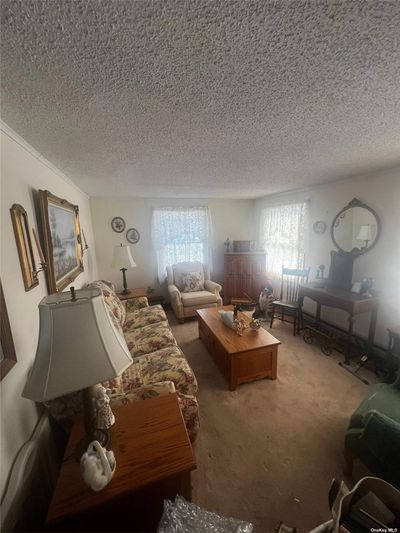 168 Village Circle W, House other with 2 bedrooms, 2 bathrooms and null parking in Manorville NY | Image 2