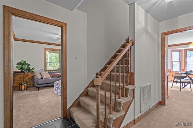 Stairs with carpet flooring and healthy amount of natural light | Image 15
