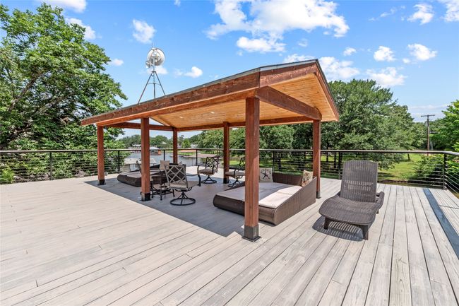 Party deck of boat dock with covered sitting area | Image 35