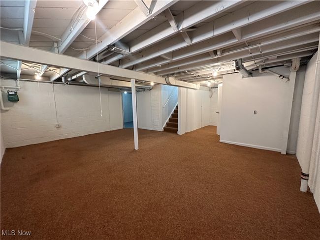 Below grade area with carpet flooring and stairs | Image 33