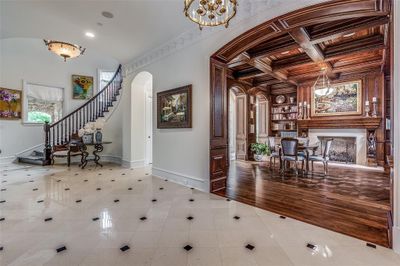 Noteworthy Library and Curved Stairwell to 2nd Level | Image 3