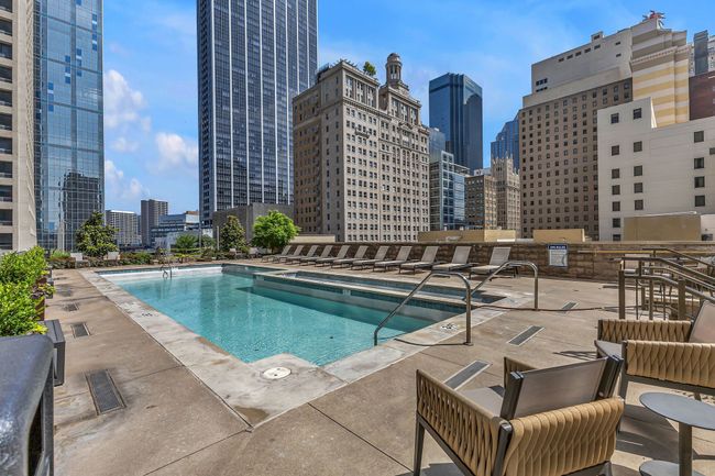 Pool featuring a view of city and a patio | Image 26