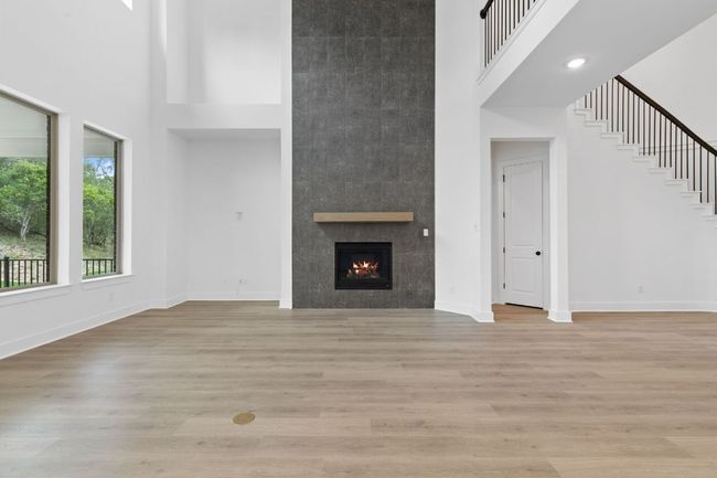Family Room with soaring ceiling & fireplace | Image 17