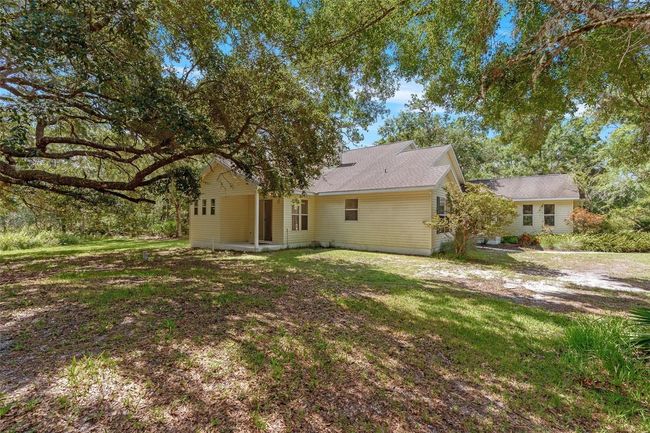 11933 Pasco Trails Blvd, House other with 4 bedrooms, 3 bathrooms and null parking in SPRING HILL FL | Image 36