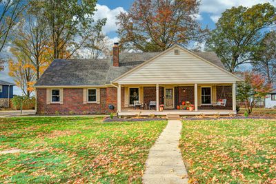 6 Bedroom 3 Bath Home with Beautiful Curb Appeal on 1/2 Acre Lot with Mature Trees! | Image 1