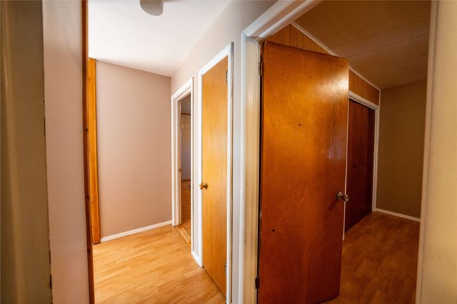 Corridor featuring light wood-type flooring | Image 13