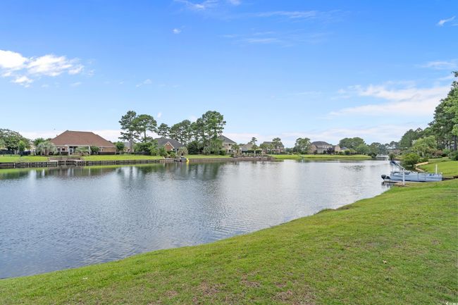 Water view with nearby suburban area | Image 18