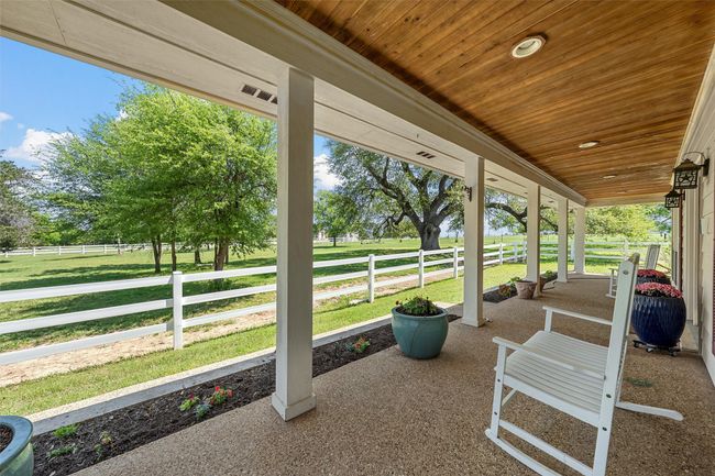 View of patio / terrace featuring a rural view and covered porch | Image 8