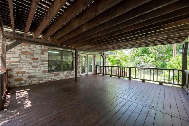 Wooden deck featuring french doors | Image 25