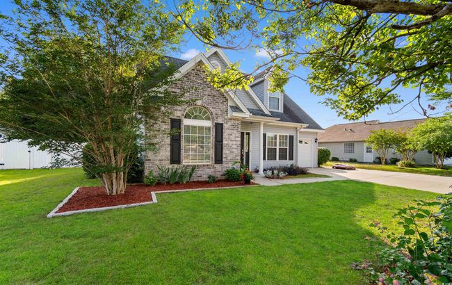 Back of property featuring a patio area and a shingled roof | Image 28