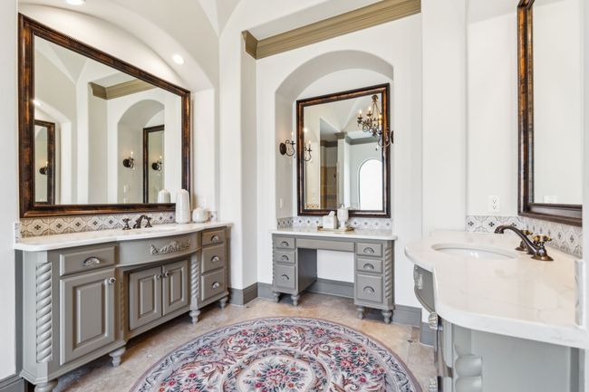 Primary Bath Features Dual Sinks, Multiple Vanities with Custom Mirrors, and Quartz Countertops | Image 18