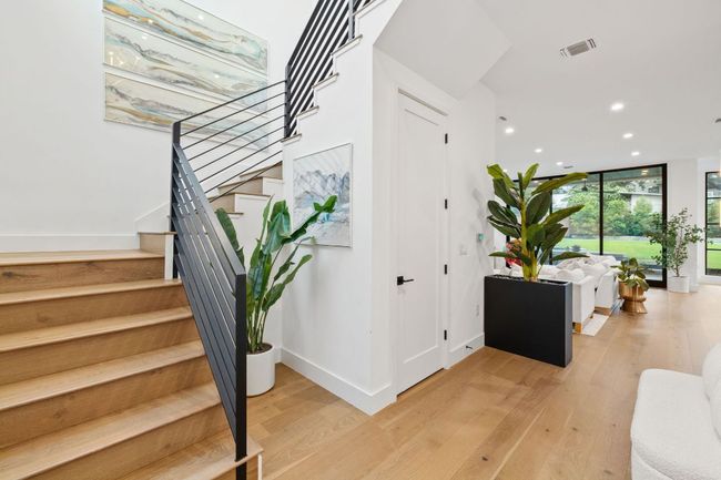 Stairway featuring wood finished floors and recessed lighting | Image 10