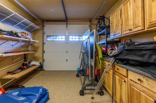 Water Toy Storage Room with Overhead Garage Door - Lower Level | Image 60