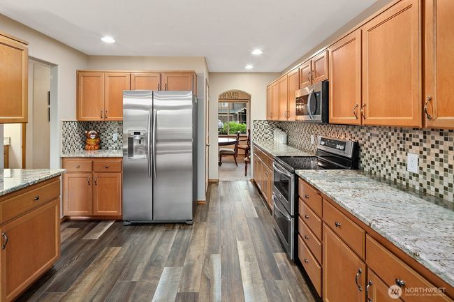 Walk in pantry situation between kitchen and dining room. | Image 9